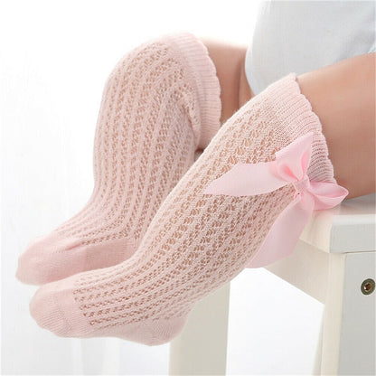 Pair of breathable baby girls' knee-high cotton socks, charming bow