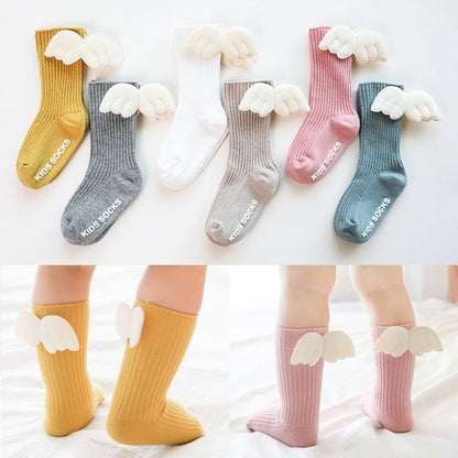 Baby girls' durable cotton knee-high socks, perfect for toddlers, with bow
