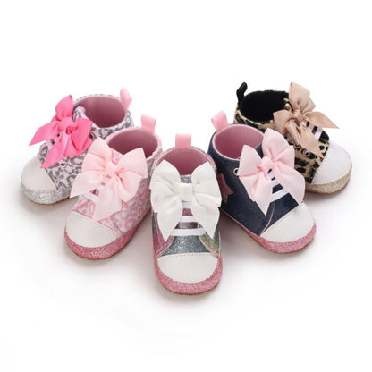 Comfortable pink hi-top first walker sneakers with bows for baby girls, soft sole