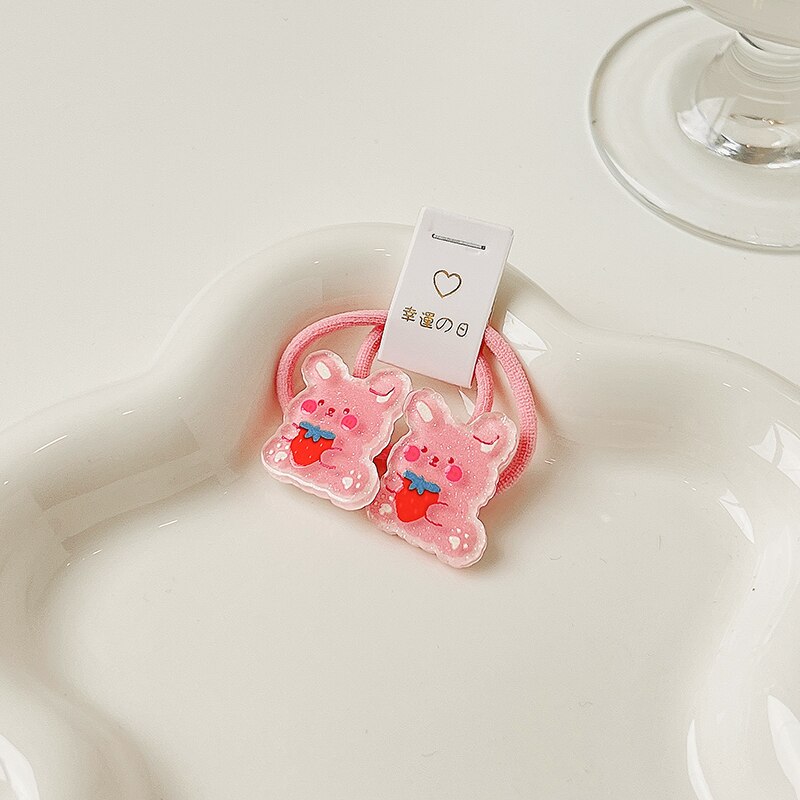 Baby girl's soft elastic headbands with decorative bows, included in a versatile accessory set