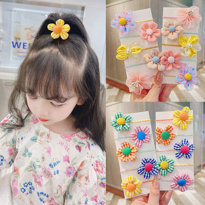 Baby girl's durable elastic hair ties and comfortable headbands for active little ones