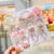 Set of 12 baby girl's elastic hair ties and 3 matching headbands, diverse accessory pack