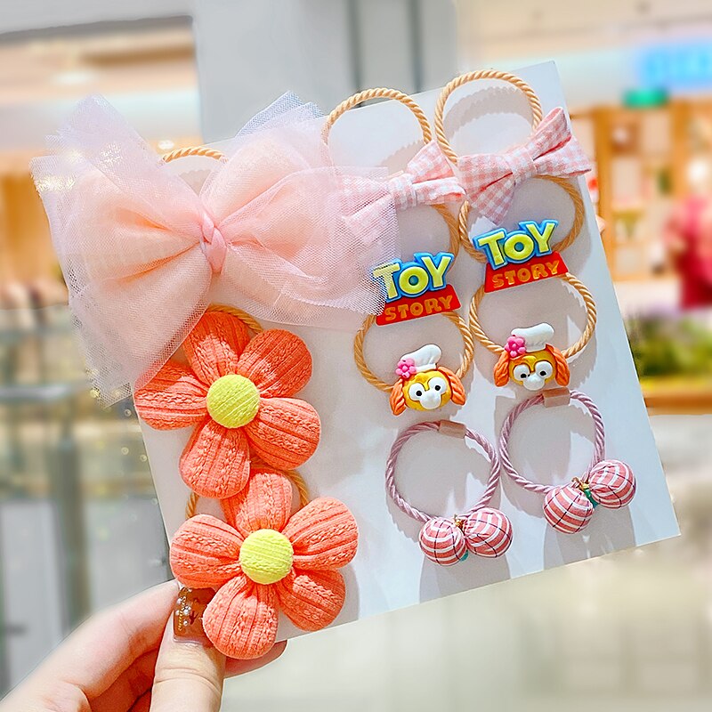 Variety pack of baby girl's elastic hair ties and headbands, gentle on delicate hair