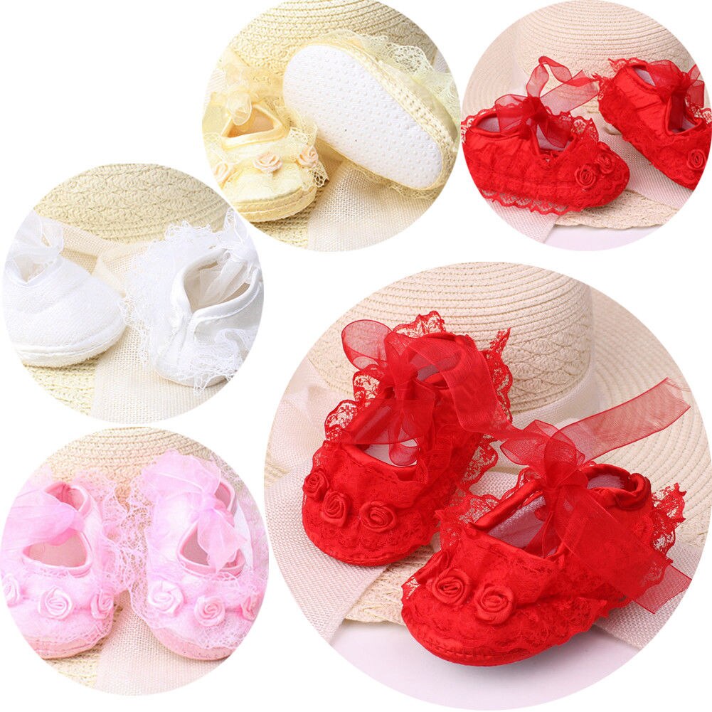 Baby girls' pink floral lace satin soft sole shoes, ideal for christening & newborns.