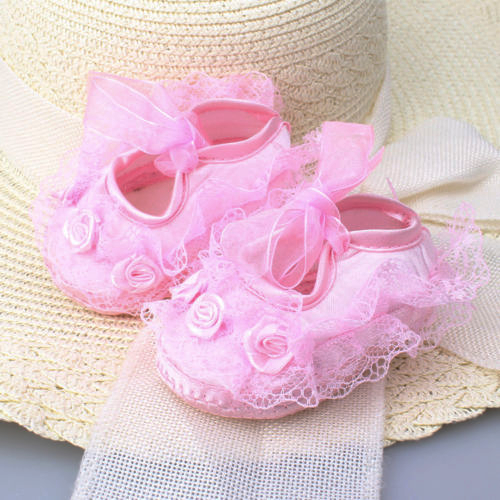 Delicate white floral lace baby girl shoes with satin ribbon, perfect prewalker soft soles.