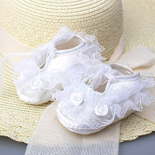 Infant baby girl shoes: blush pink satin and floral lace, designed for comfort and style.