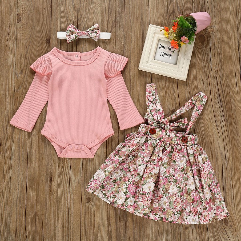 Baby girls' pink floral ruffled romper & skirt set, perfect for summer. Cotton blend baby outfit.
