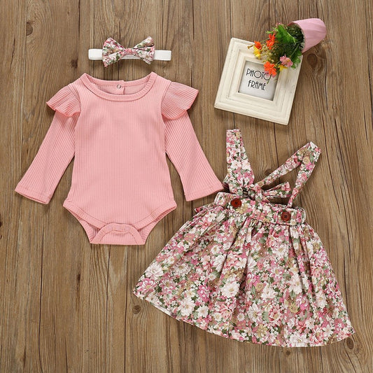 Baby girls' pink floral ruffled romper & skirt set, perfect for summer. Cotton blend baby outfit.