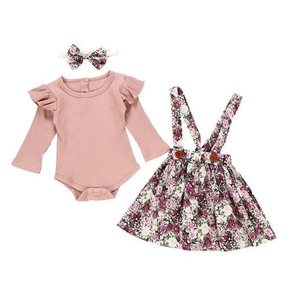 Baby girls' mauve floral summer outfit. Ruffled romper & skirt set, perfect for warm weather.