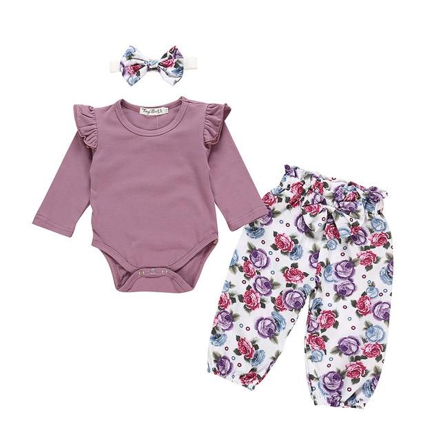 Gift-ready baby girls' pink floral ruffled romper & skirt set. Comfortable cotton blend baby clothing.