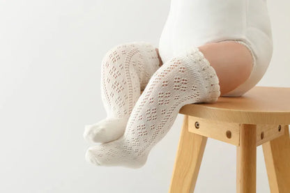 White baby girls' knee-high socks, hollow knit, enhancing breathability for active toddlers
