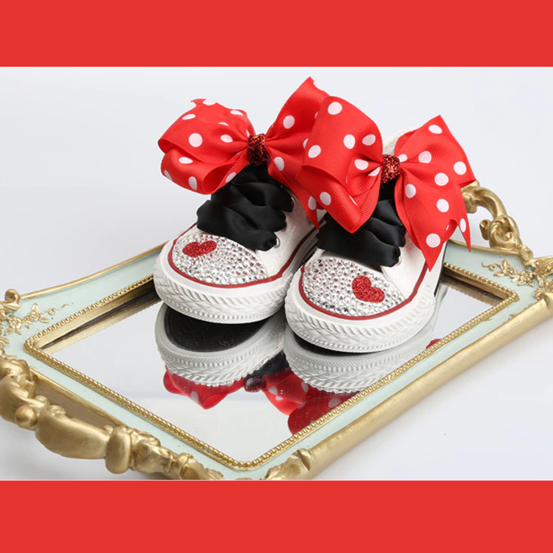Adorable lace-up dotted canvas shoes with a bowknot, ideal for baby girl's everyday wear.