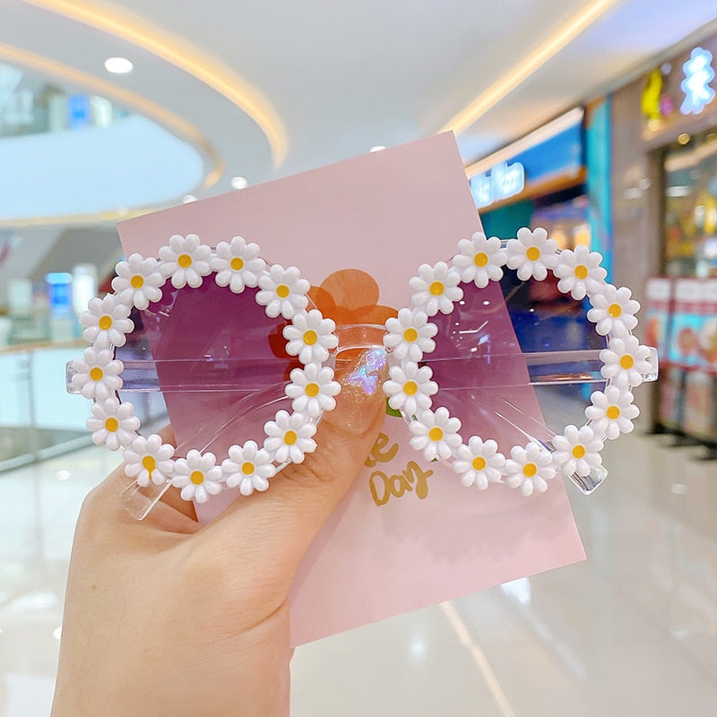 Stylish pink round sunglasses for baby girls, providing excellent UV protection