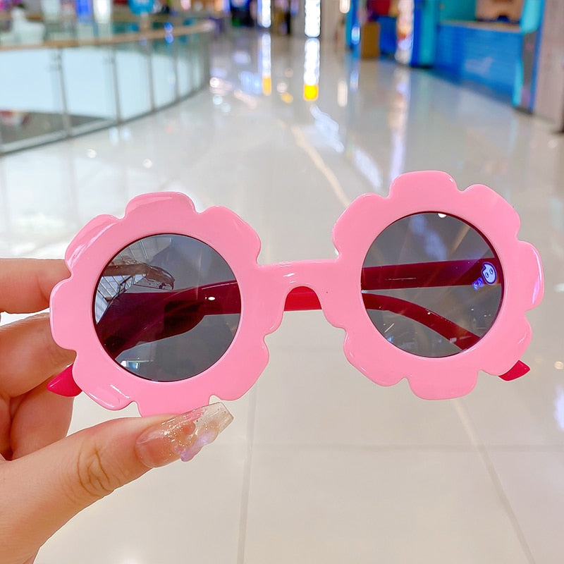 Durable pink round UV protection sunglasses for baby girls, a must-have accessory