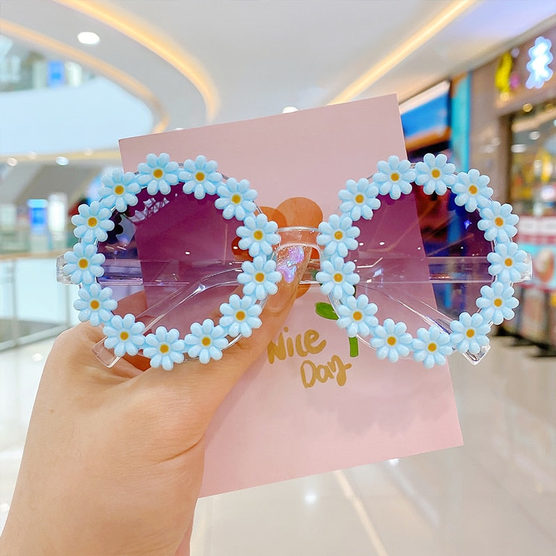 Stylish baby girls' round UV protection sunglasses in vibrant pink, infant eyewear