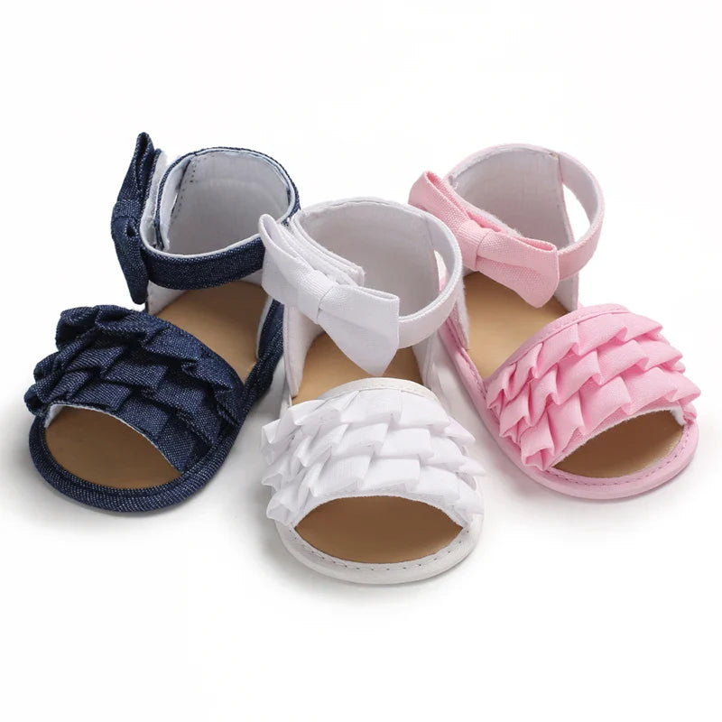 Close-up of the delicate bow on Baby Girls' Summer Ballet Sandals, newborn