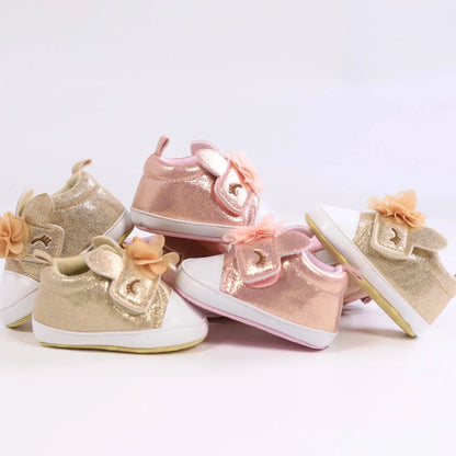 Baby girls' pink unicorn first walker shoes with hook-and-loop closure, perfect for toddlers.