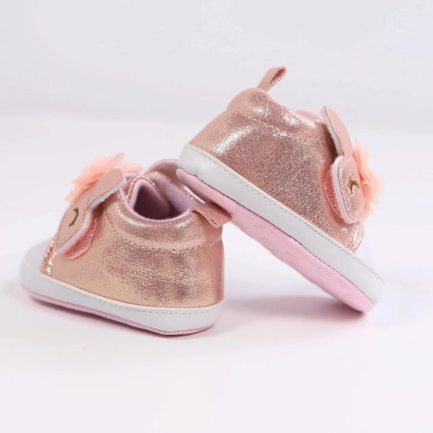 Baby girls' adorable unicorn first walkers with easy hook-and-loop adjustments.