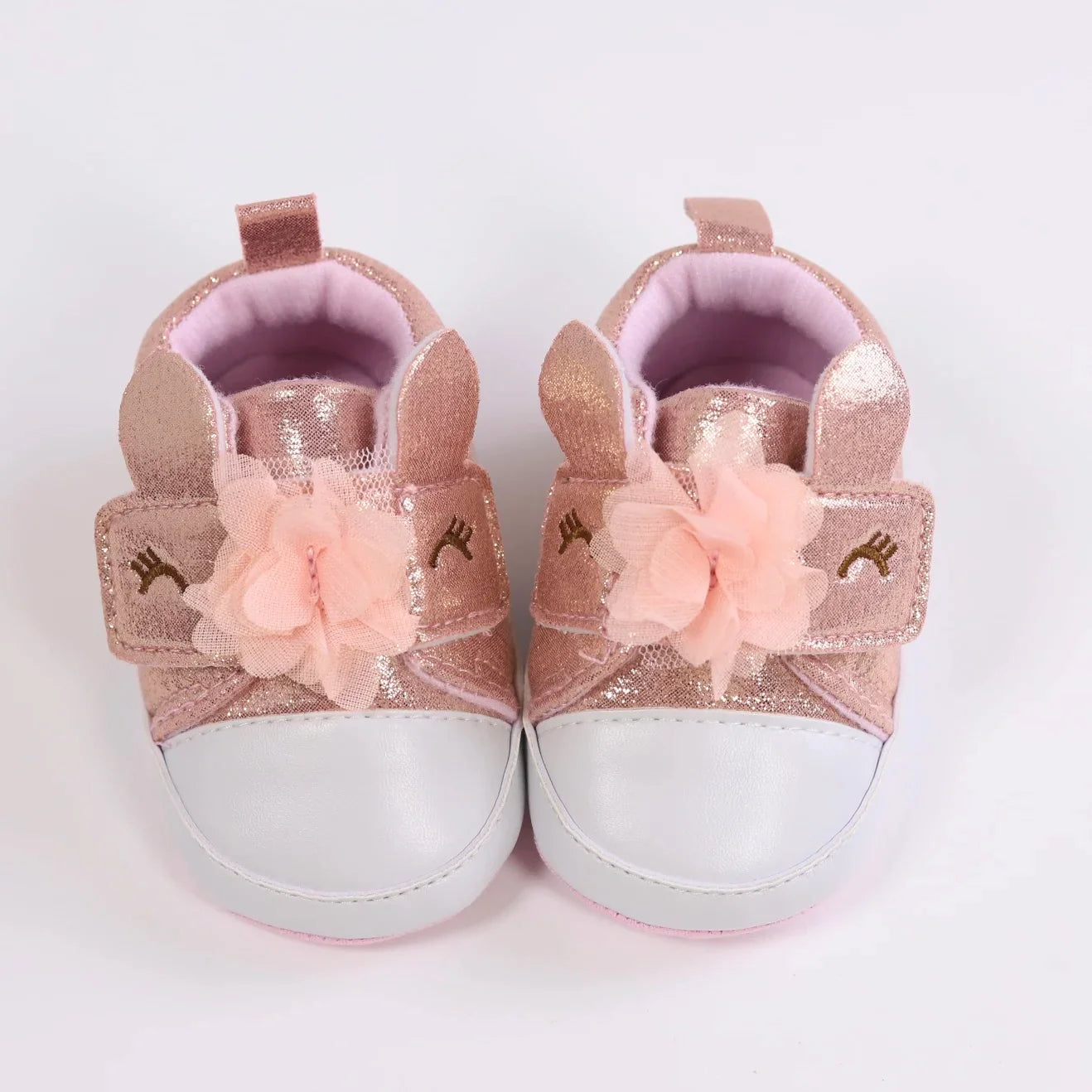 Baby girls' cute unicorn first walkers, ensuring comfort during those precious first steps.