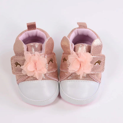Baby girls' cute unicorn first walkers, ensuring comfort during those precious first steps.