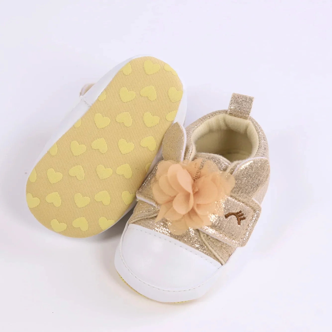 Baby girls' enchanting unicorn first walkers, designed for comfort and style.
