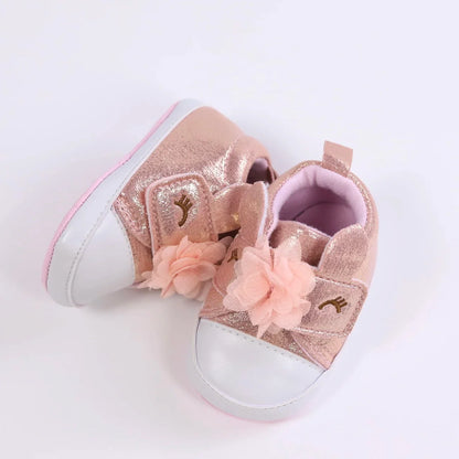 Tiny feet delight: Unicorn themed first walker shoes for baby girls, pink color.