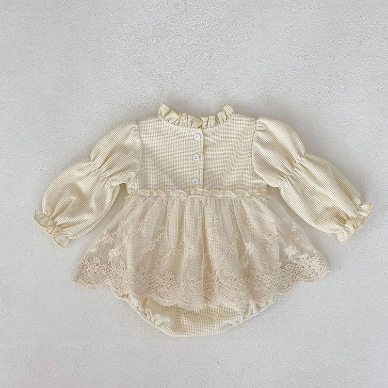 Stylish baby girls' autumn wear: pink waffle knit bodysuit with puff sleeves and pretty lace.
