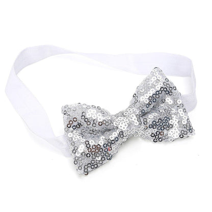 Cute baby wearing a pink sequin bow headband, ideal for special occasions and toddler fashion