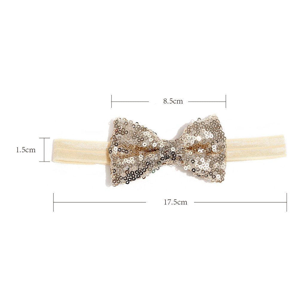 Elegant baby girls' sequin bow headband, adding charm to any infant outfit, a great baby gift