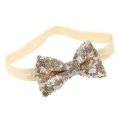 Adorable pink sequin bow headband, designed for comfort and style for baby girls