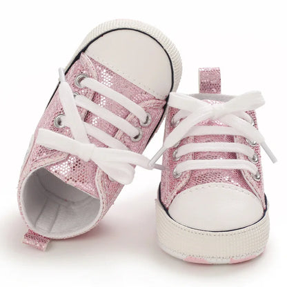 Infant girls' first walking shoes, soft canvas with eye-catching sequin embellishments