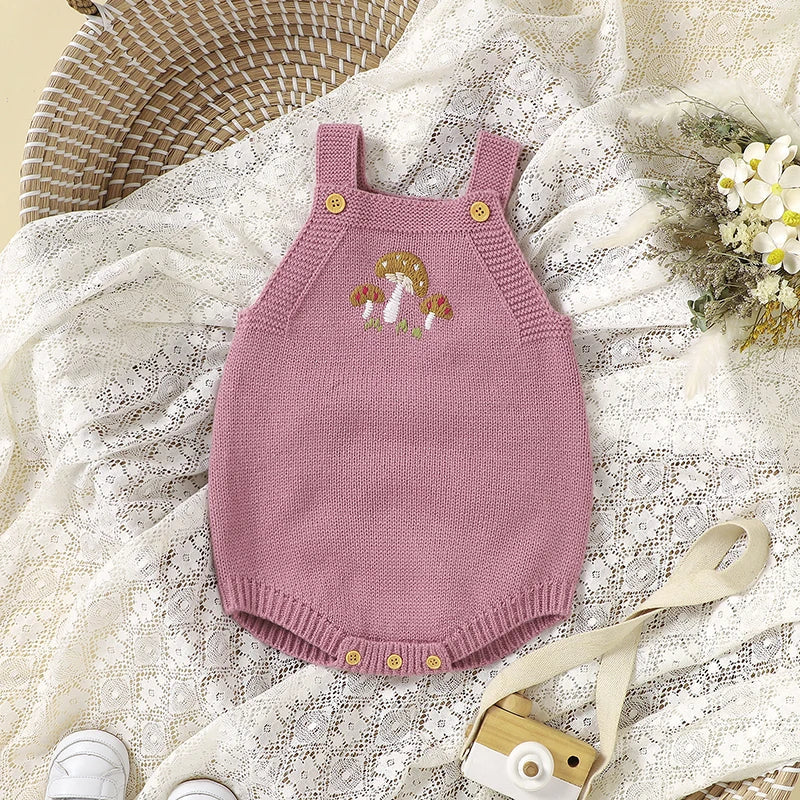 Soft acrylic sleeveless baby romper for girls, durable and fashionable infant clothing.