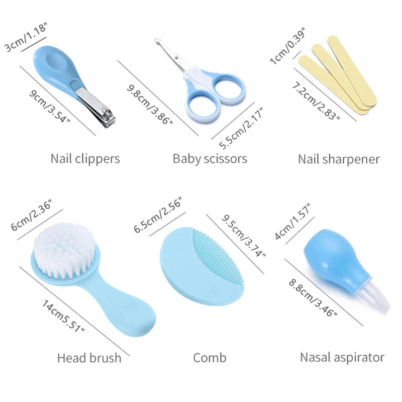 Portable baby grooming kit with soft brush, comb, nail clipper, and nasal aspirator.
