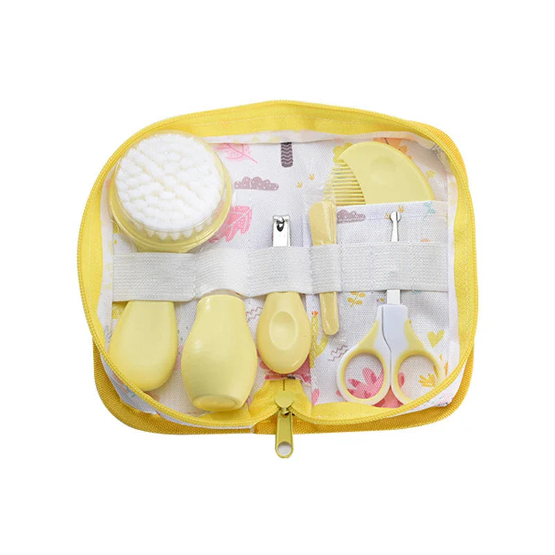 Mom and baby first aid kit with grooming essentials like nail clippers and aspirator.