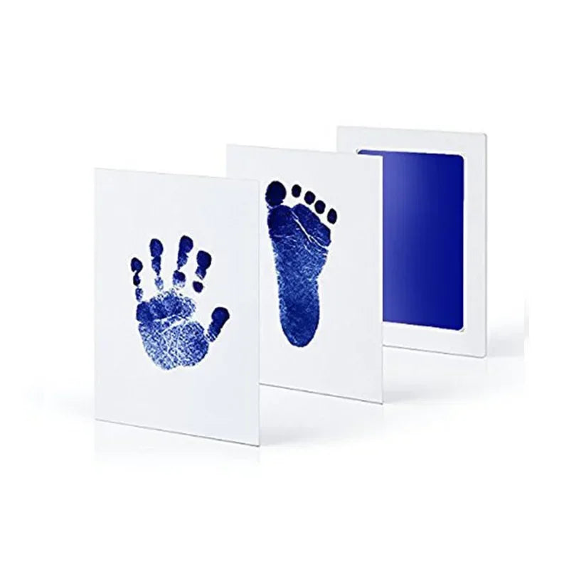 Parents excitedly using the inkless kit to make baby's handprint, unique souvenir