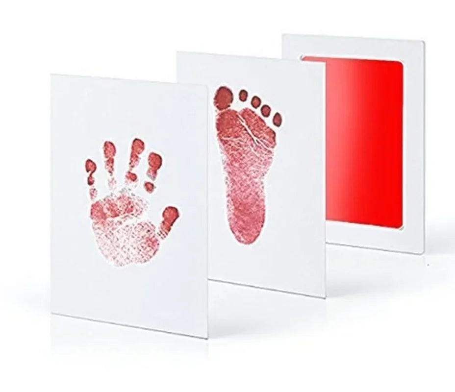 Inkless print kit showing zero mess on baby's hand after use, non-toxic