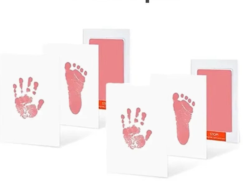 Finished inkless baby handprint & footprint displayed in a frame, lasting memory