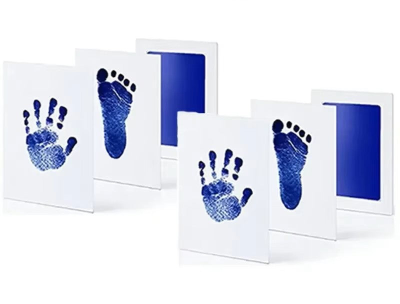 Contents of the inkless handprint and footprint kit spread out, complete set