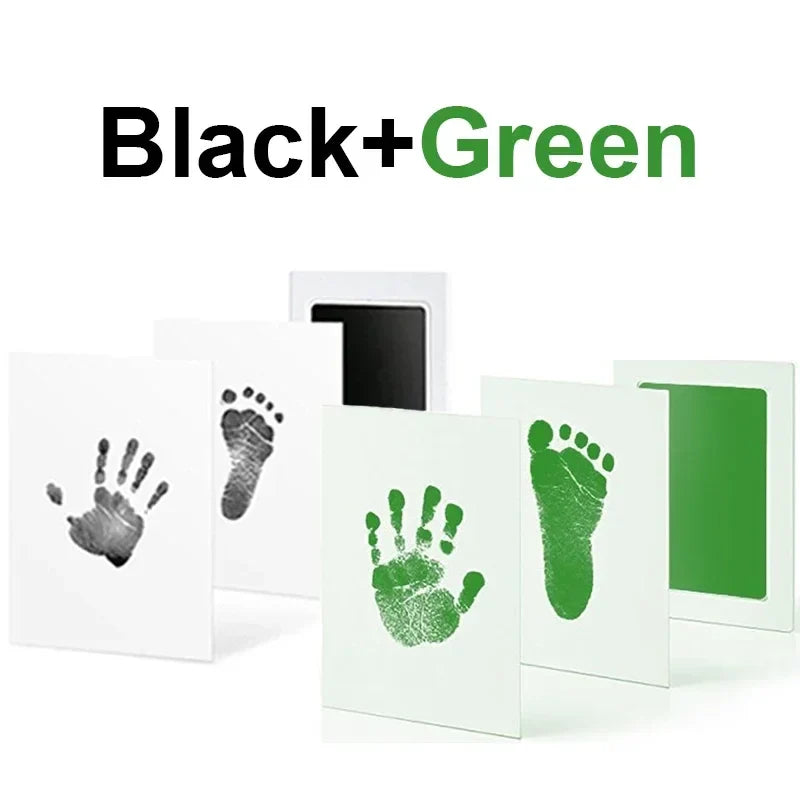 Baby's adorable hand making an inkless print on a white card, baby accessory