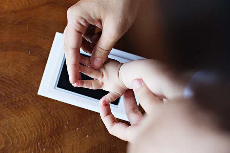 Safe, non-toxic baby handprint kit for creating lasting infant memories