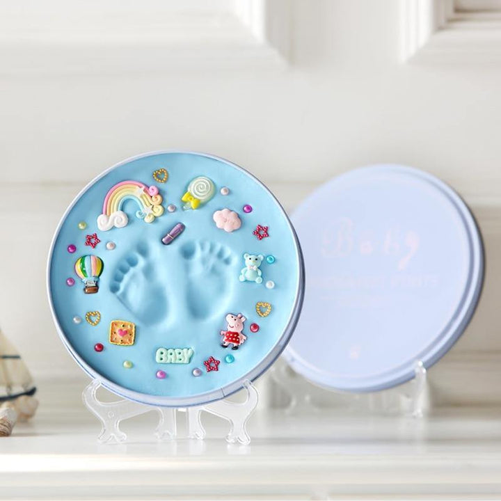 Baby handprint footprint memory clay frame kit, perfect keepsake for infants.