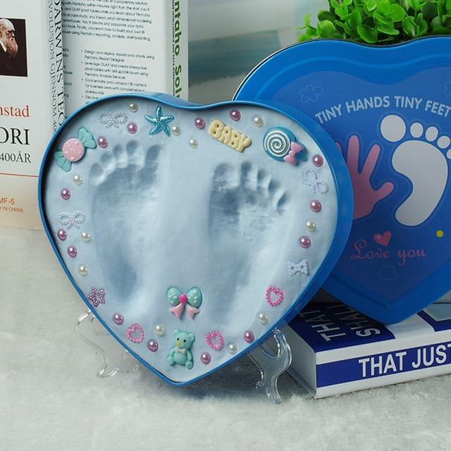 Baby shower gift: personalized handprint footprint memory frame kit with non-toxic clay.
