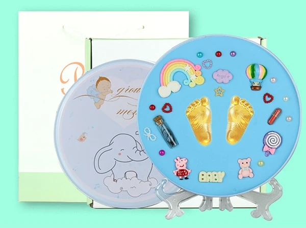 Unique baby shower gift: memory frame clay kit for capturing tiny handprints and footprints.