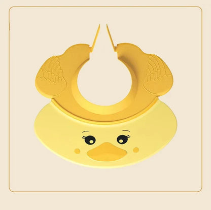 Green Baby Hippo Shampoo Visor Cap, ready for use, emphasizing its easy-to-clean silicone material.