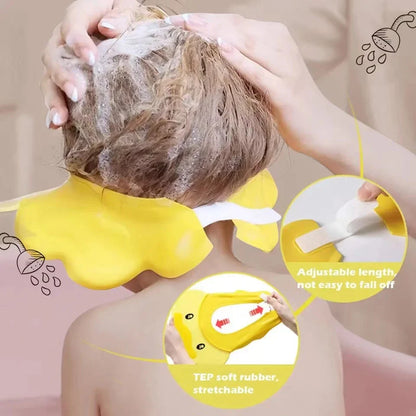 Green Baby Hippo Shampoo Visor Cap with adjustable strap, essential baby care bathing accessory.