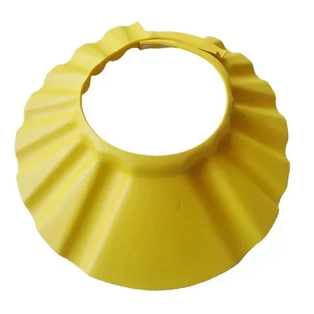 Close-up of blue Baby Hippo Shampoo Visor Cap, showing flexible silicone material for baby hygiene.