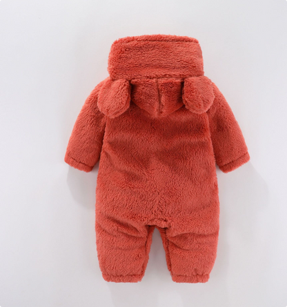 Infant hooded romper in soft fleece, perfect for winter, with practical diaper access.