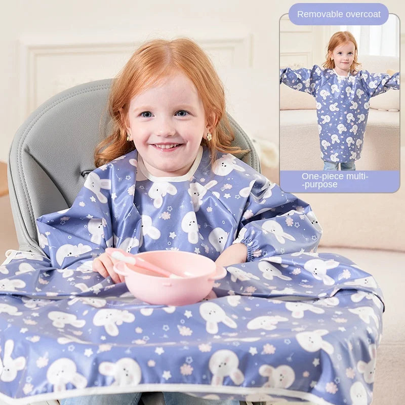 Side view of a detachable long-sleeved baby bib, showcasing the secure snap buttons on the back.