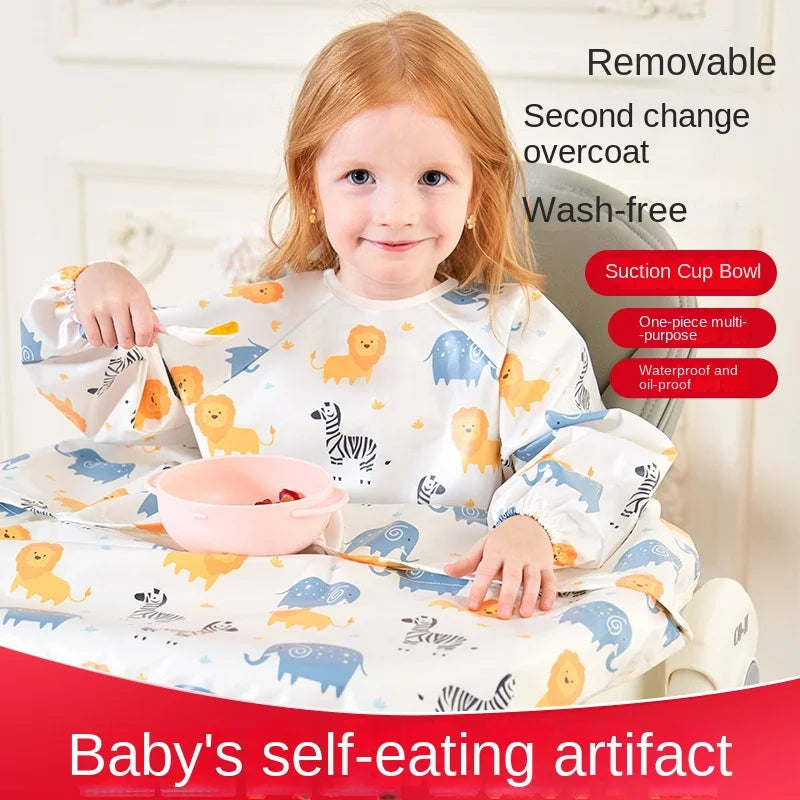 Green waterproof toddler smock with elastic cuffs, designed for messy playtime and feeding.