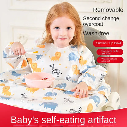 Green waterproof toddler smock with elastic cuffs, designed for messy playtime and feeding.